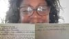 Berta Soler, líder de las Damas de Blanco, muestra el documento entregado por funcionaria de la Oficina de Multas.