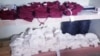 Uniformes escolares en una tienda estatal de Holguin. (Captura de foto/Empresa de Comercio Rafael Freyre/Archivo)