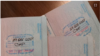 Tres pasaportes cubanos con estampas de Inmigración de parole humanitario, pueden verse en Tampa EEUU, el 21 de diciembre de 2023.