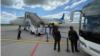 Llegada de cubanos en un vuelo de deportación desde EEUU a Cuba.