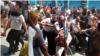 Combinación de imágenes de la detención del pastor Lorenzo Rosales Fajardo en Palma Soriano, Santiago de Cuba, el 11 de julio de 2021.