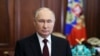 El presidente de Rusia, Vladímir Putin, durante un llamado a la población a participar en las presidenciales que culminaron este domingo en Moscú. (Mikhail Metzel, Sputnik, Kremlin Pool Foto vía AP)