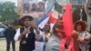 Cubanos se manifiestan en Bruselas el 17 de julio de 2023 por la presencia de representantes del régimen cubano en la reunión de la CELAC.