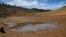 Una zona de Oroville, California, donde están bajando los niveles de agua. (Patrick T. Fallon / AFP).