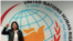 Ailex Marcano posa en una de las paradas de su gira por Europa donde denunció las injusticias del 11J.