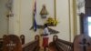 Una religiosa en una Iglesia Católica en Jovellanos, Matanzas. Foto Archivo YAMIL LAGE / AFP.