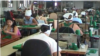 Las operarias del taller textil de Camajuaní durante la pandemia confeccionaron hasta 700 mascarillas diariamente.