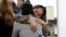 María José Aragón abraza a María José Martínez, en Miami el 15 de noviembre de 2023. Ambas son exprisioneras políticas del régimen de Daniel Ortega.(AP Photo/Lynne Sladky).