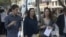 Mariela Castro y sus hijos en el desfile de Chanel. (Foto: OnCuba)