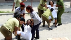 Dama de Blanco denuncia violencia de policía política durante arresto Dama de Blanco denuncia violencia de policía política durante arresto