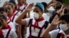 Alumnos con máscaras, en La Habana. (AP Photo/Ramon Espinosa).