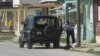 Policía arresta a la Dama de Blanco Caridad Burunate camino a la iglesia (Iván Hernández Carrillo).