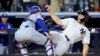 El receptor de los Dodgers de Los Ángeles, Will Smith (16), marca al bateador designado de los Yankees de Nueva York, Giancarlo Stanton (27), en el plato de home durante el tercer juego de la Serie Mundial de la MLB de 2024. (Brad Penner-Imagn Images v[ia Reuters)