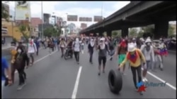 Nueva batalla campal entre opositores y chavistas en calles venezolanas Nueva batalla campal entre opositores y chavistas en calles venezolanas
