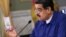 Maduro posterga reconversión monetaria y dice que reducirá 5 ceros al bolívar.