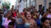 Creyentes cubanos participan en una procesión el 7 de septiembre de 2023. REUTERS/Alexandre Meneghini
