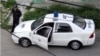 Una patrulla de la policía política en una calle de La Habana.