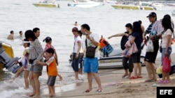 Turistas chinos.