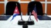 Banderas de EEUU y Cuba. (Archivo)