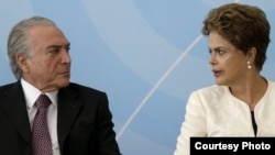 Dilma y Michel Temer, vicepresidente y líder del Partido del Movimiento Democrático Brasileño, parte de la coalición de gobierno.