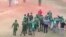 La Brigada Especial del Ministerio del Interior (MININT) interviene al caldearse los ánimos tras la suspensión del juego el miércoles en el estadio de Santiago de Cuba, en una foto tomada de redes sociaeles.