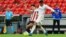La contienda se define entre el Atlético de Madrid y el Real Madrid. (Ander GILLENEA / AFP)
