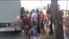 Pasajeros abordan un camión en la terminal de ómnibus de Santiago de Cuba. (Captura de video/UNPACU)