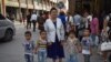 Mujer de la minoría étnica uigur en China. (Greg Baker / AFP).
