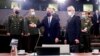 El secretario general de OTAN, Jens Stoltenberg, centro, y el viceministro de Relaciones Exteriores de Rusia, Alexander Grushko, cuarto a la derecha, llegan al Consejo OTAN-Rusia en la sede de la OTAN en Bruselas, el 12 de enero de 2022. Foto: Olivier Hoslet, Mancomunada via AP.
