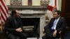 Encuentro de Marco Rubio (d) con Luis Enrique Ferrer (i).