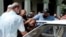 Un hombre es detenido en las protestas antigubernamentales del 11 de julio de 2021.