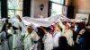 Yorubas en Cuba en el ritual de la Letra del Año. (Adalberto Roque / AFP).