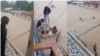 Vecinos rescatan a un anciano atrapado en las inundaciones en San Antonio del Sur. (Captura de video/Facebook)
