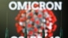 Cartel publicitario de vacunas contra variante Ómicron en Londres.