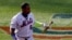 El cubano Yoenis Céspedes de los Mets de Nueva York tras poncharse en un juego ante los Bravos de Atlanta, el sábado 25 de julio de 2020. (AP Foto/Adam Hunger)